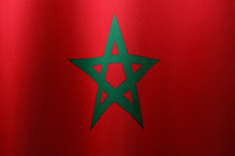 Detailed close-up of the Moroccan flag, highlighting its vibrant colors and iconic green star.